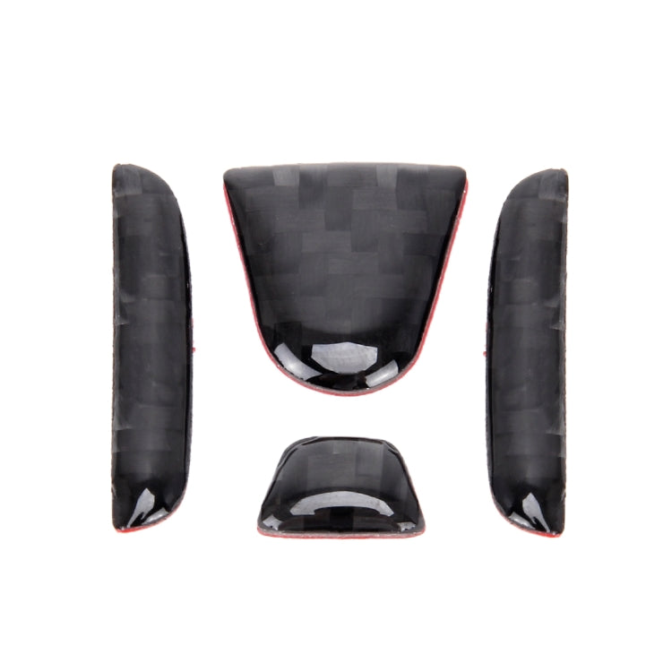 Set of three black carbon-fiber texture steering wheel trim pieces with red border