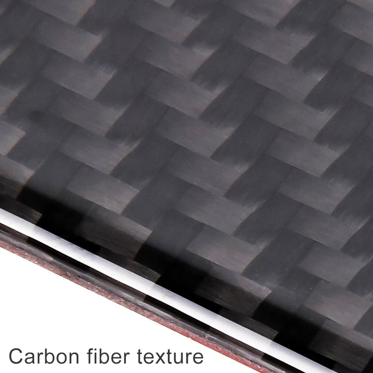 Close-up of carbon fiber texture sticker strip, dark gray weave pattern