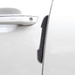 Black carbon fiber door edge guard installed on car door edge, curved protective strip.