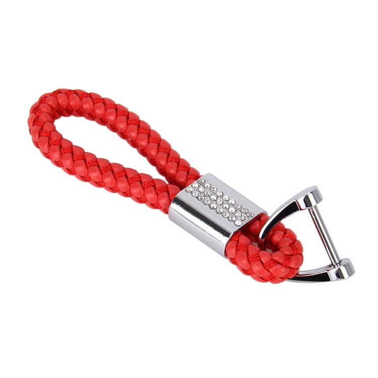 Red braided leather keyring with crystal-studded metal center and polished key loop.