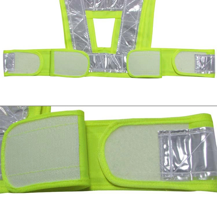 Neon yellow reflective safety vest with wide front pockets and silver strip accents