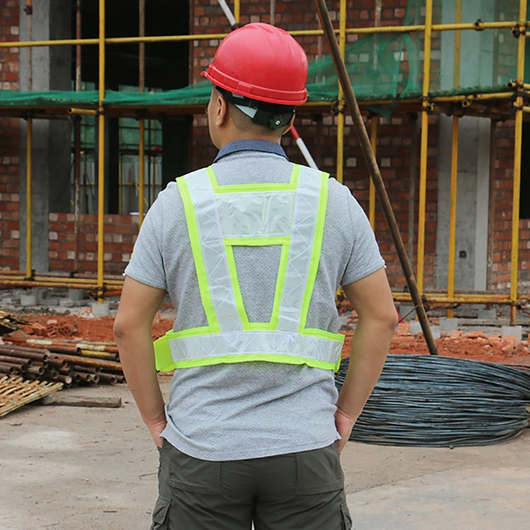 Neon yellow reflective safety vest back view with large cross and vertical reflective strips