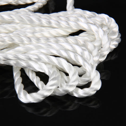 Close-up of white twisted braided rope strands