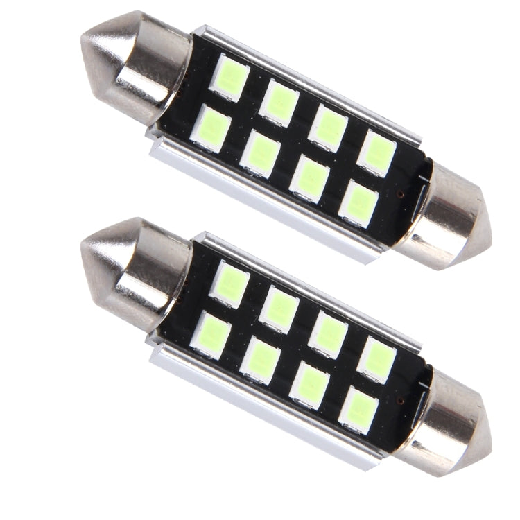 Pair of festoon LED bulbs with black circuit board and green SMD LED chips