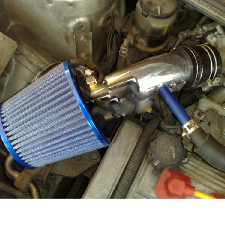 Blue pleated mushroom-style air filter with clamp fitting, installed in engine