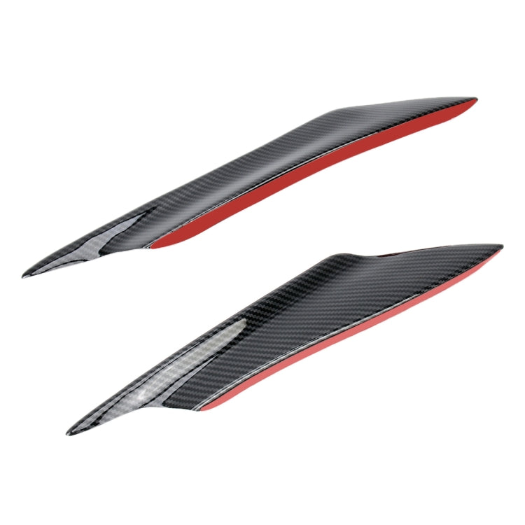 Two carbon-fiber flank stickers with red edge trim