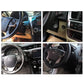 Car push start switch shown on vehicle dashboard with blue-lit control panel