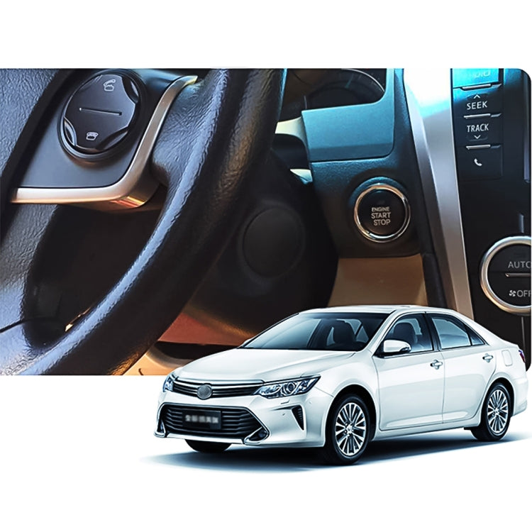 Car push start switch with blue ring on dashboard console