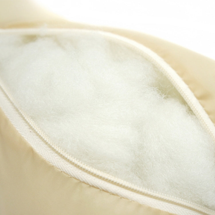Light beige leather car neck pillow edge with white piping and stitched seam