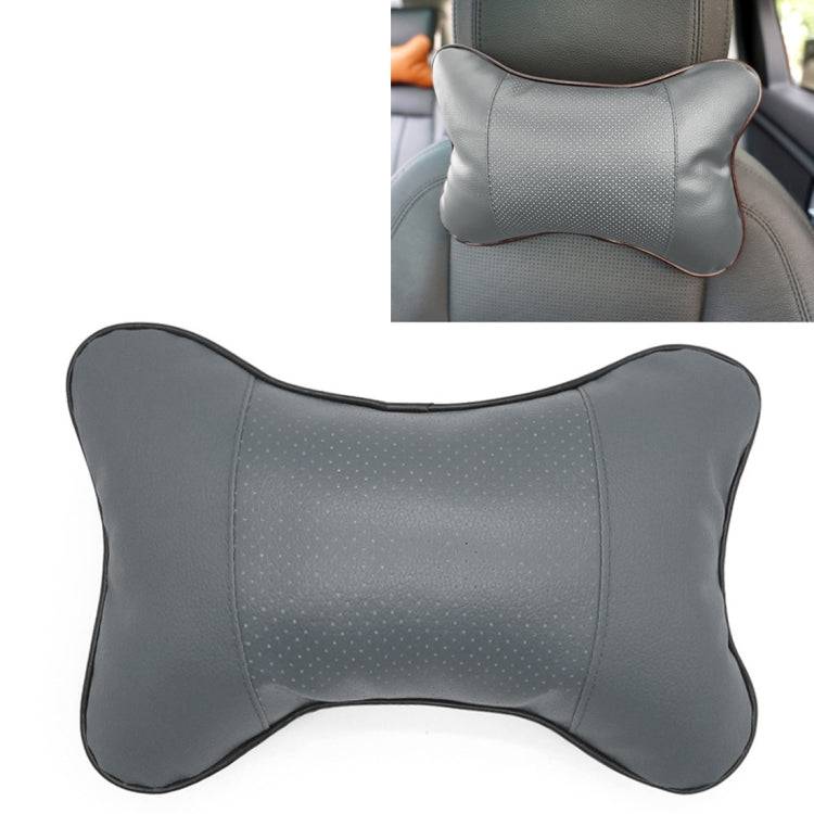 Gray breathable leather car neck pillow with bone-shaped design and perforated center
