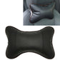 Black leather car neck pillow with perforated center panel and rounded bone shape