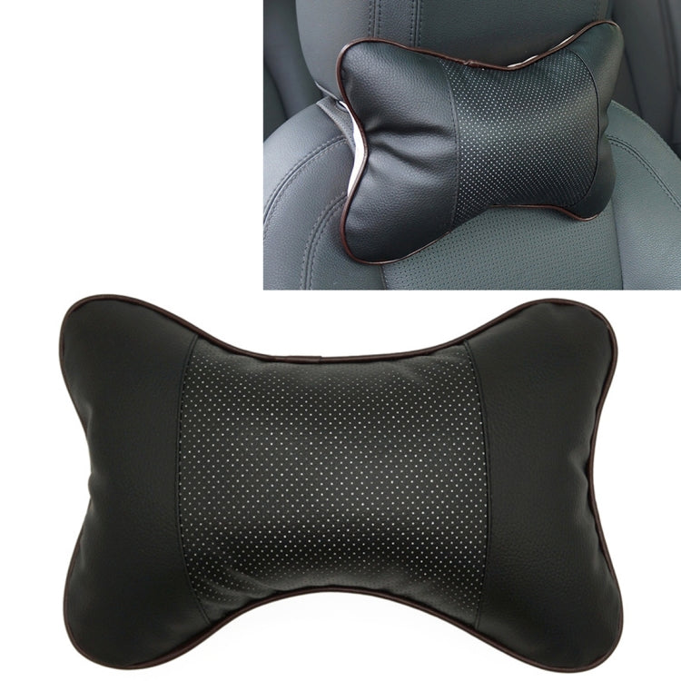 Black leather car neck pillow with perforated center panel and rounded bone shape