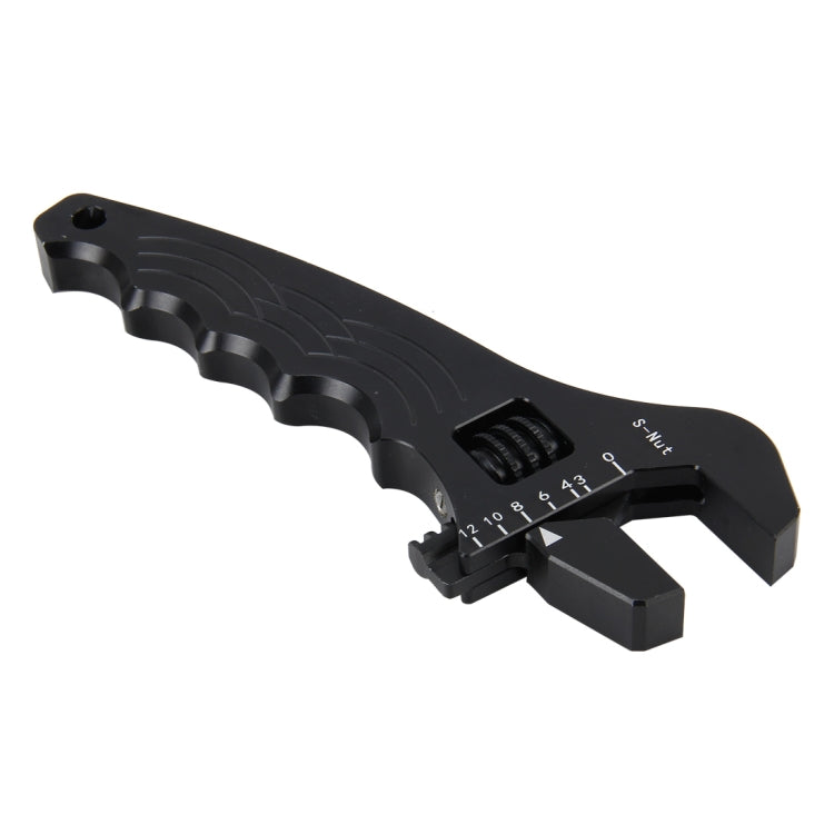 Adjustable spanner wrench, black, angled view of adjustable jaws and dial