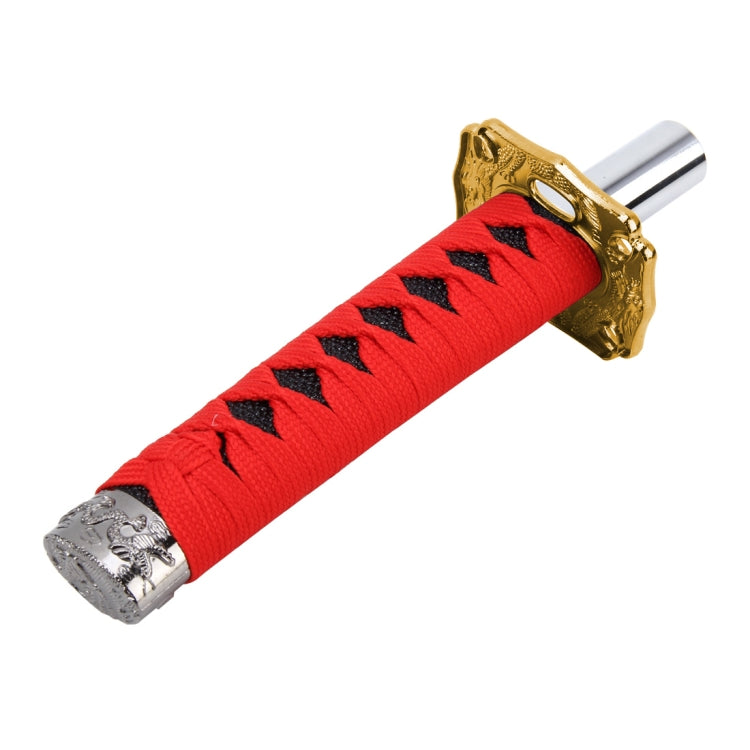 Universal hand brake lever cover grip, red sleeve with black accents and gold metal mount