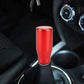 Red gear shift knob for car, smooth rounded cylinder