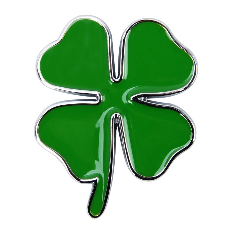 Four-leaf clover emblem sticker with green fill and chrome border, centered close-up