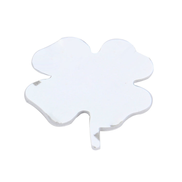Four-leaf clover emblem sticker with white fill and chrome outline, badge backplate
