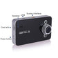 Car dash cam DVR side view showing lens, card slot, USB port, and power