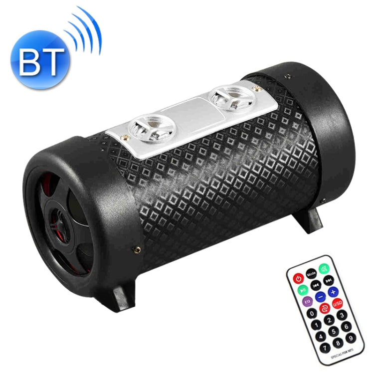 Black 4-inch round subwoofer speaker with remote control and Bluetooth indicator