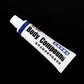 Car body compound squeeze tube, white with blue stripe, capped nozzle