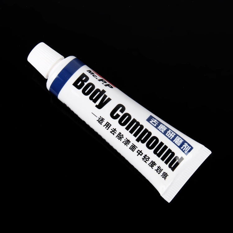 Car body compound squeeze tube, white with blue stripe, capped nozzle