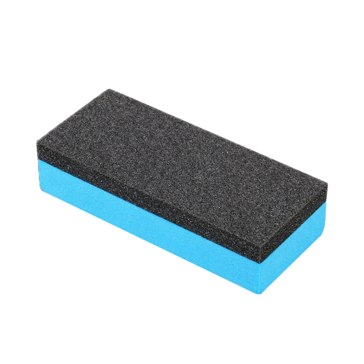 Polishing sponge block with dark gray abrasive face and light blue backing