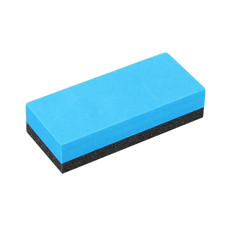 Polishing sponge block with blue foam body and dark abrasive side