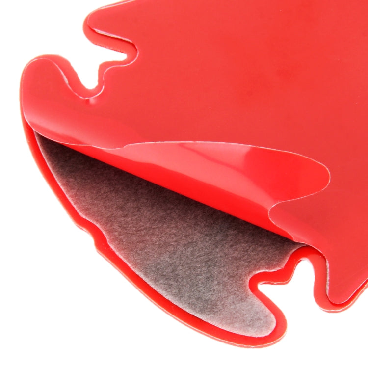 Car door handle protection sticker, red with dark underside, close-up