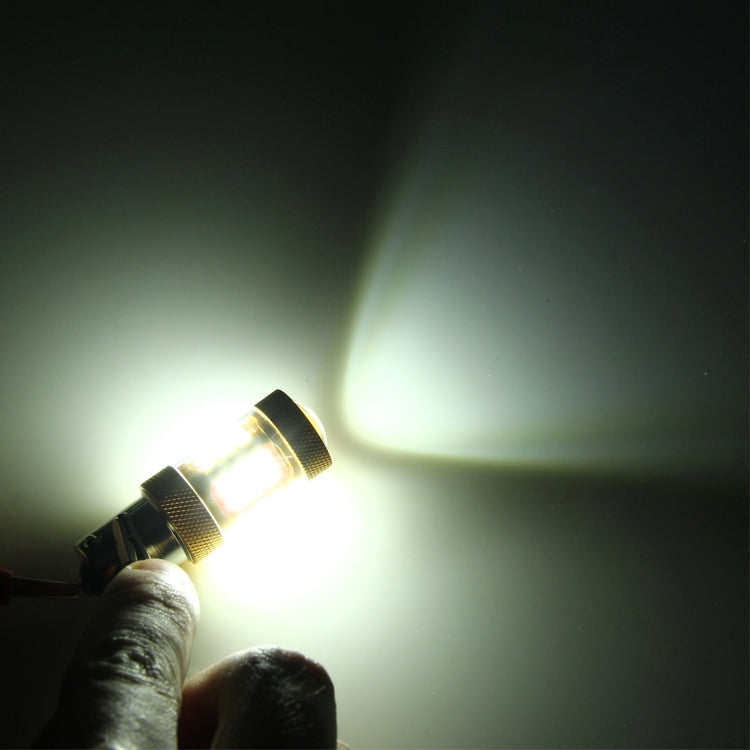 Bright white LED glow from 3157 bulb, gold bezel, black plug base