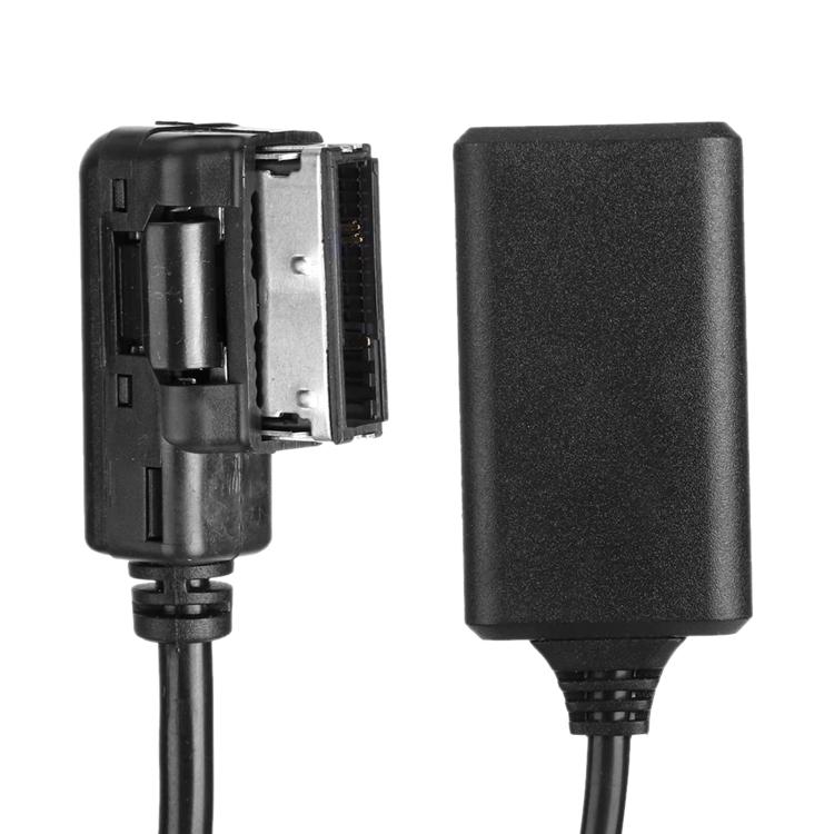 Black wiring harness adapter with exposed connector ports and housing