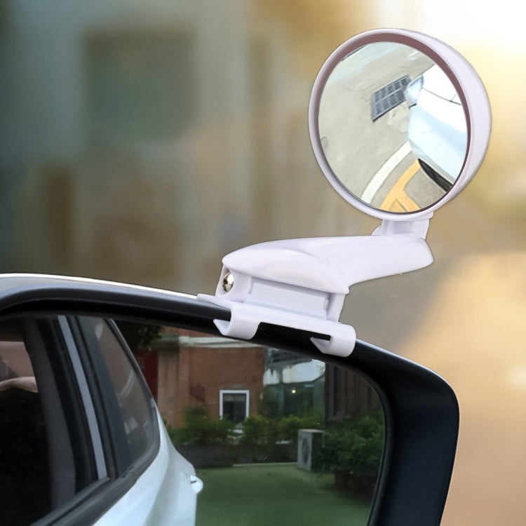 White adjustable blind spot car mirror mounted on vehicle side