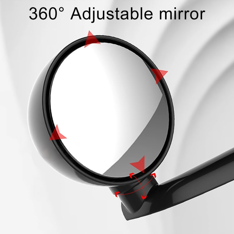 Round adjustable mirror showing 360° viewing angle on car