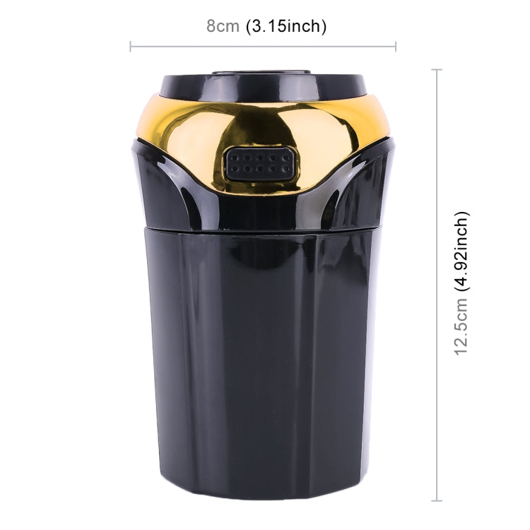 Gold and black car ashtray lighter measuring 8cm wide and 12.5cm tall