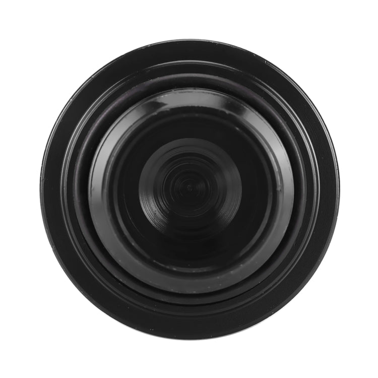 Black oil cap cover with smooth central face and ridged outer ring