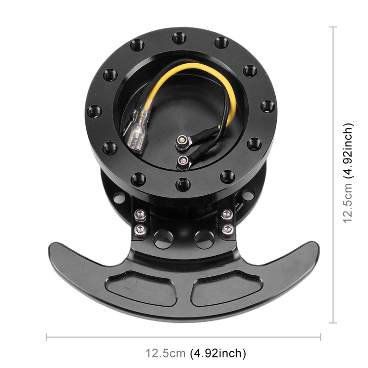 Black snap-off steering wheel hub quick release adapter, top view; size shown at 12.5 cm.
