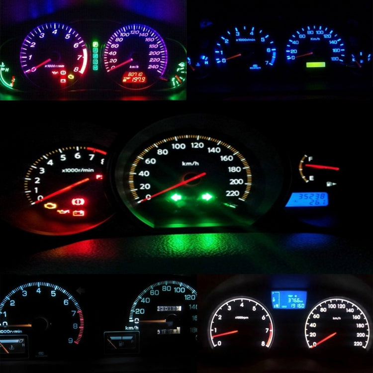 Vehicle instrument panel with illuminated LED indicator lights showing green and red cues