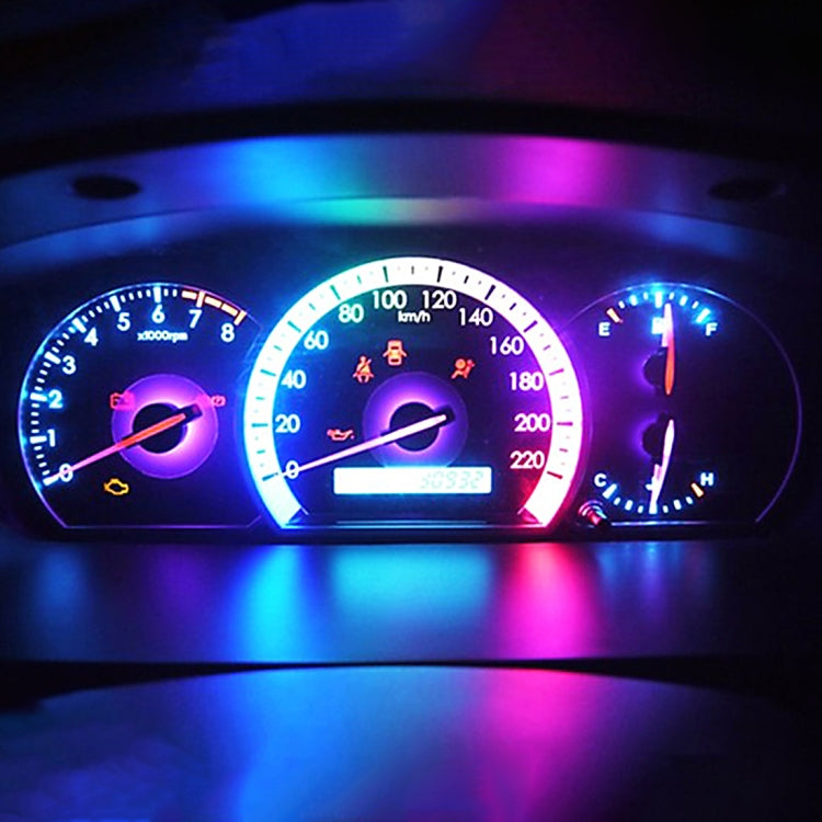 Vehicle instrument cluster with blue-lit and red-lit LED indicator lighting on gauges