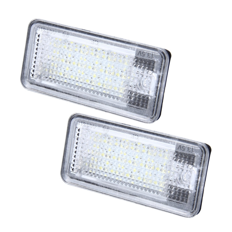 Two rectangular LED license plate lights with clear lens and white SMD LED array