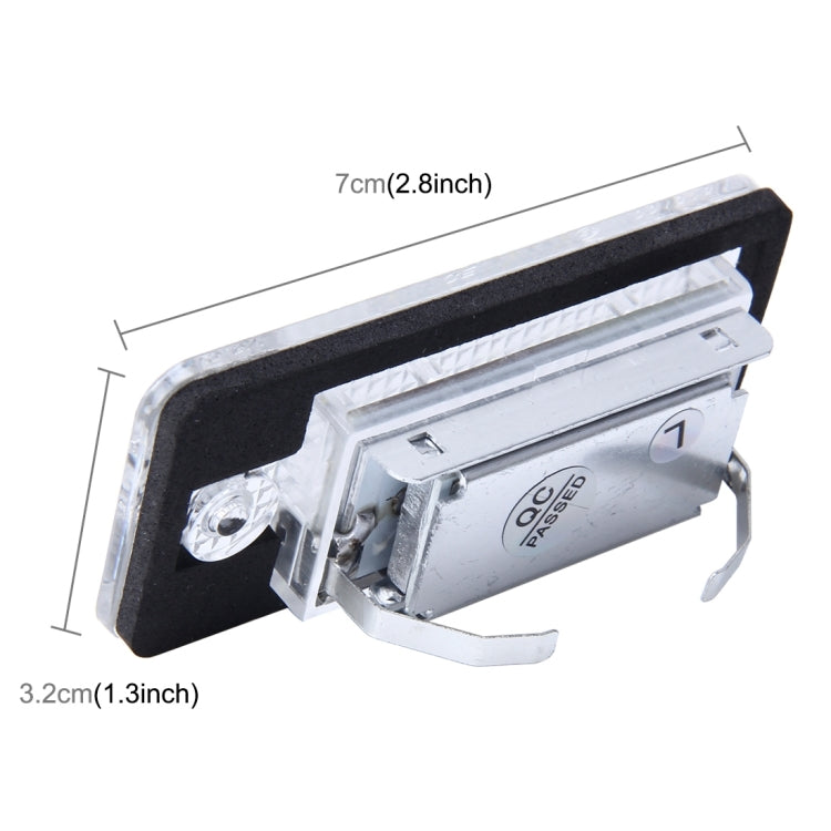 LED license plate light with black housing and metal bulb base for mounting