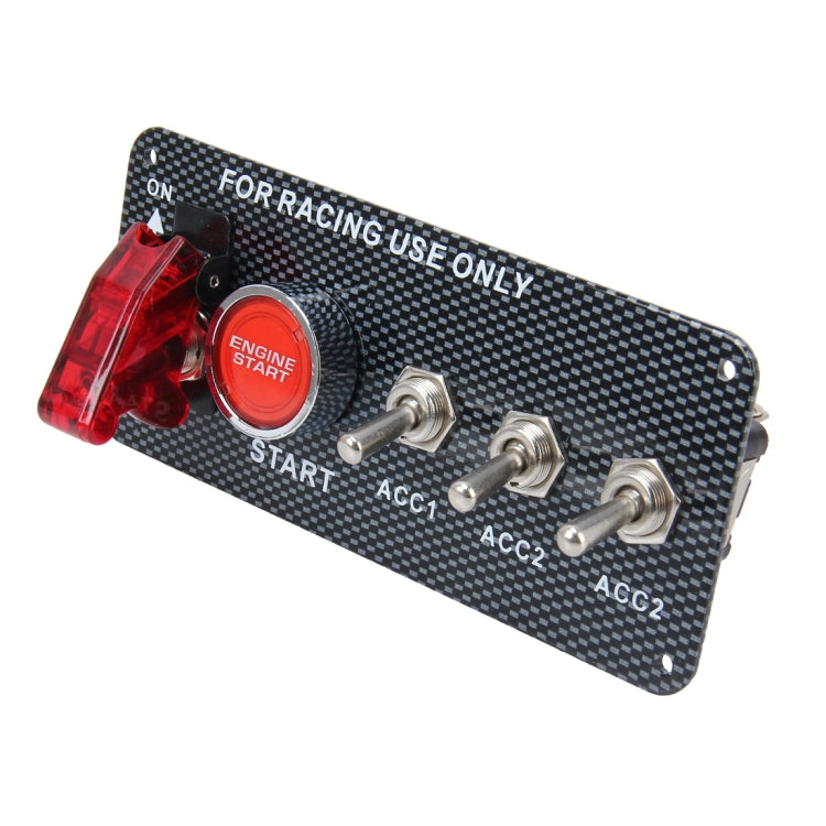Carbon fiber ignition switch panel with red Engine Start button, ON switch, and ACC1/ACC2 ports
