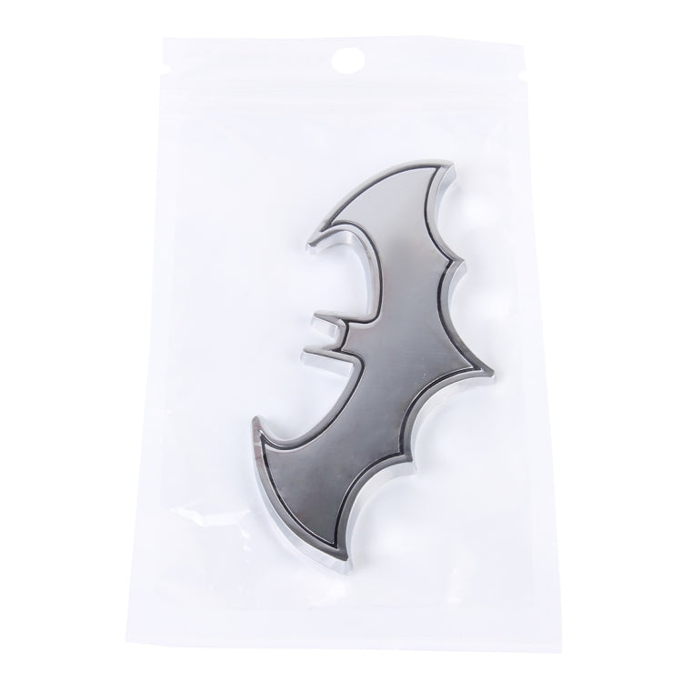 Metal bat car sticker with shiny black bat design on a hanging card