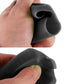 Black rubber buckle lock cover held in hand, close-up