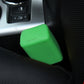 Green rubber car seat belt buckle lock cover on car seat