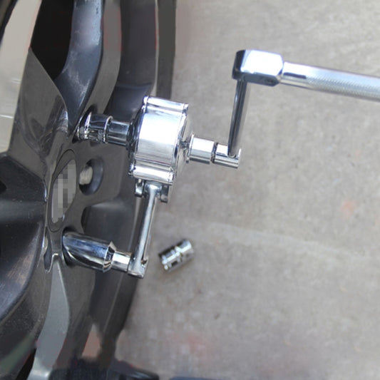 Chrome lug nut torque multiplier tool attached to wheel, showing socket and handle