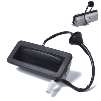 Black tailgate release switch with wiring harness and white connector plug