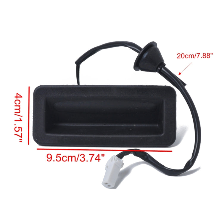 Black rectangular release switch with cable and white connector plug