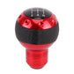 Red and black gear shift knob with smooth base and perforated grip top