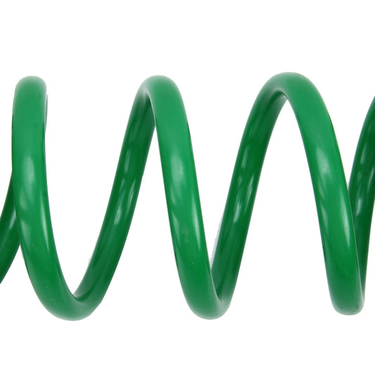 Green spiral hose tube, close-up of the spring coil ribbing