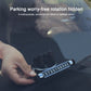 Hand holding black car dash parking number holder with digit strip and base