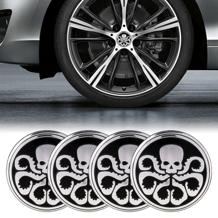 Set of 4 round wheel hub stickers with black-and-white skull pattern